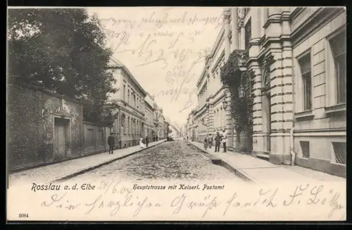 AK Rosslau a. d. Elbe, Hauptstrasse mit Kaiserlichem Postamt