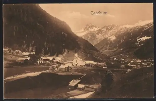 AK Gaschurn, Teilansicht des Ortes mit Gebirgspanorama