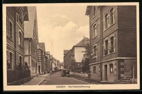 AK Siegen, Strasse Hermelsbacherweg mit Auto