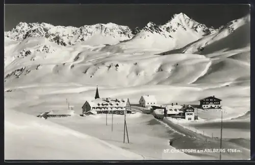 AK St. Christoph am Arlberg, Ansicht der tief verschneiten Ortschaft im Winter