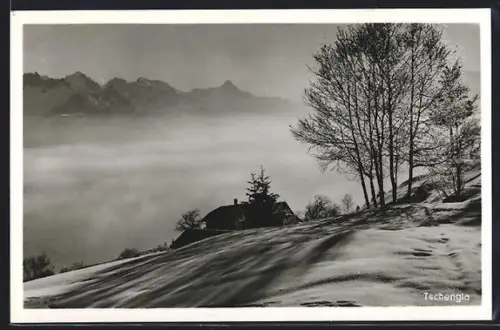 AK Tschengla, Teilansicht im Winter mit nebelverhangenem Tal