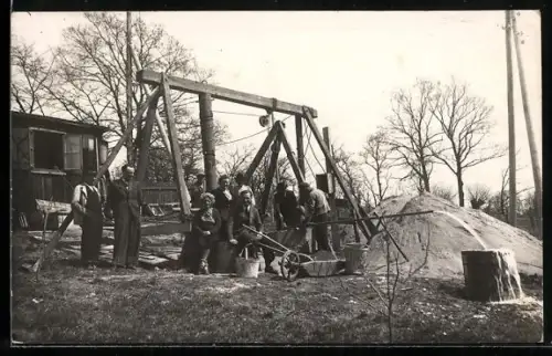 AK Lambach /O.-Ö., Brunnenbau Franz Schierl, Brunnenarbeiten auf der Wiese