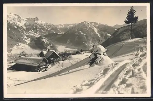 AK Tschengla, Winterlandschaft mit vereinzelten Häusern und Gebirgspanorama