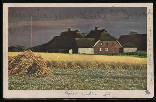Foto-AK RPH: Stürmischer Abend, Häuser hinter einem Feld