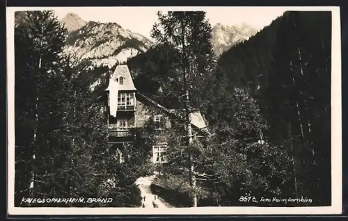 AK Brand, Kriegsopferheim mit Grünanlagen und Gebirge im Hintergrund