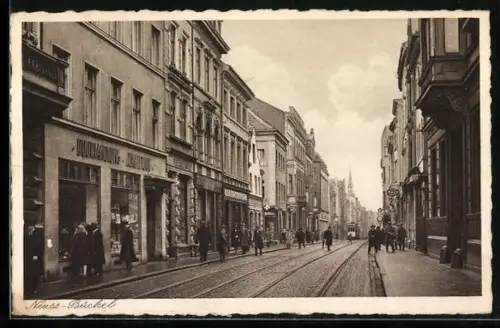 AK Neuss, Büchel-Strasse mit Buchhandlung & Strassenbahn