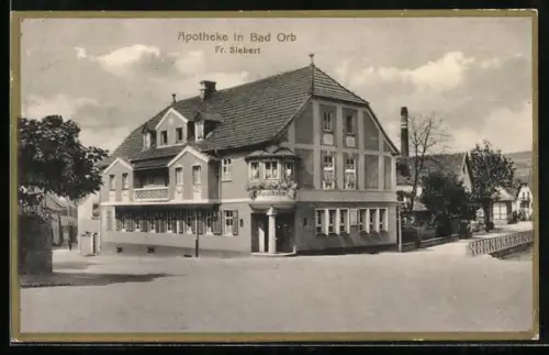 AK Bad Orb, Strassenpartie an der Apotheke von Fr. Siebert