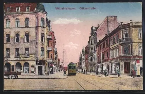 AK Wilhelmshaven, Gökerstrasse mit Strassenbahn, Litfasssäule, Kreuzung