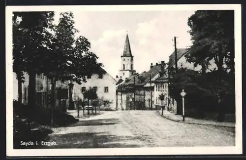 AK Sayda i. Erzgeb., Strassenpartie mit Kirche