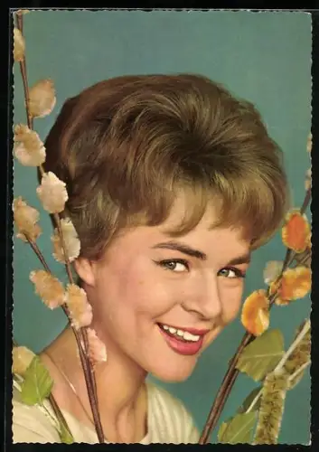 AK Musikerin Conny mit freundlichem Lächeln