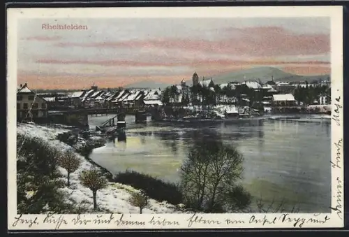 AK Rheinfelden, Stadtpanorama im Winter mit Brücke und Uferpartie