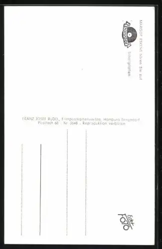 AK Margot Eskens in einer gepunkteten Bluse