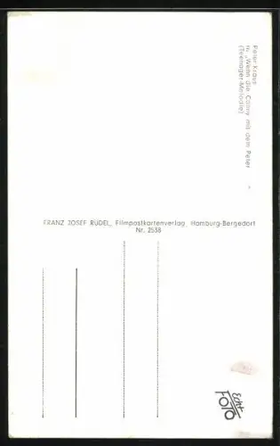 AK Peter Kraus mit Skiern im Schnee