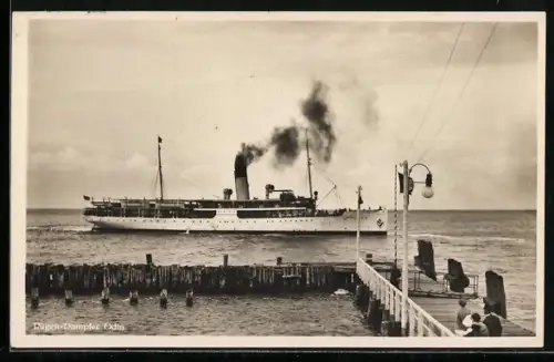 AK Bäderdampfer Odin in Fahrt vor einer Seebrücke, Passagierschiff