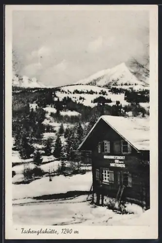 AK Tschenglahütte, Mit schneebedecktem Wald im Hintergrund