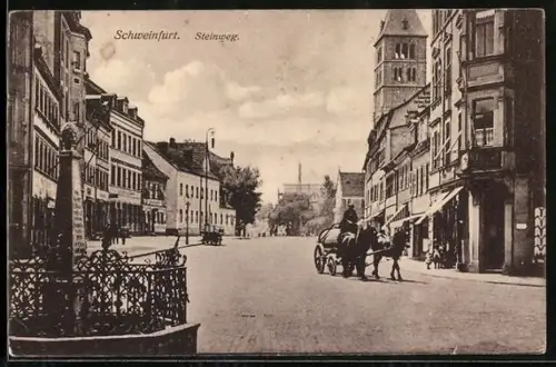 AK Schweinfurt, Steinweg, Strassenpartie mit Denkmal und Pferdewagen