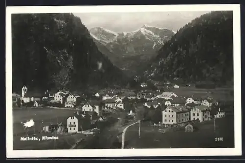 Foto-AK Mallnitz, Ortsansicht mit Alpenmassiv