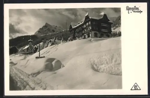 AK Gargellen i. Montafon, Hotel und Kapelle im Schnee