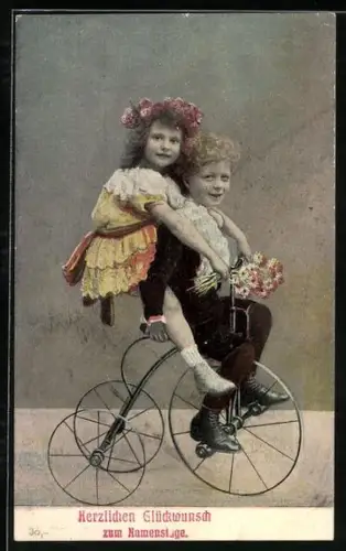 AK Kinderpaar auf einem Dreirad, Glückwunsch zum Namenstag