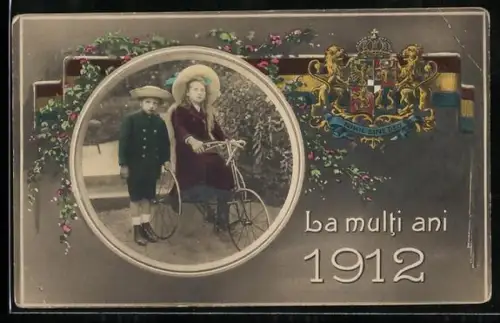 AK Kinderpaar mit einem Dreirad, Wappen 1912, Passepartout