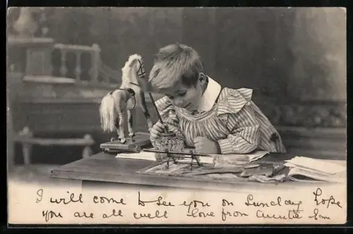 AK Kleiner Junge mit einem Spielzeugpferd