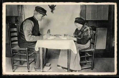 AK Brabantsch-Dorpsleven, Het middagmaal, altes niederländisches Paar beim Mittagessen