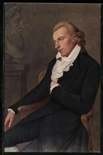 AK Friedrich Schiller sitzt in einem Stuhl und blickt nachdenklich zur Seite