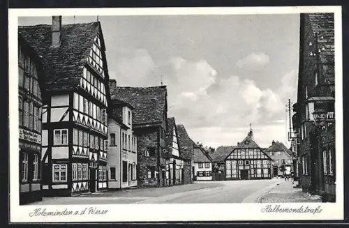 AK Holzminden a. d. Weser, Halbermondstrasse mit Geschäften