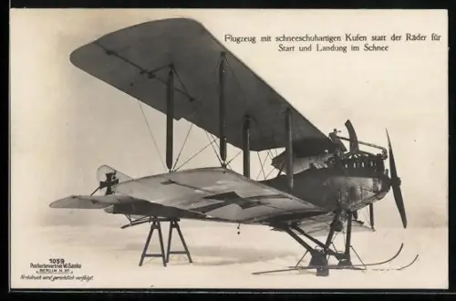 Foto-AK Sanke Nr. 1059: Flugzeug mit schneeschuhartigen Kufen auf verschneiter Piste