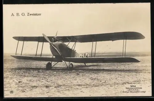 Foto-AK Sanke Nr. 1046: A. E. G. Zweisitzer auf dem Landeplatz