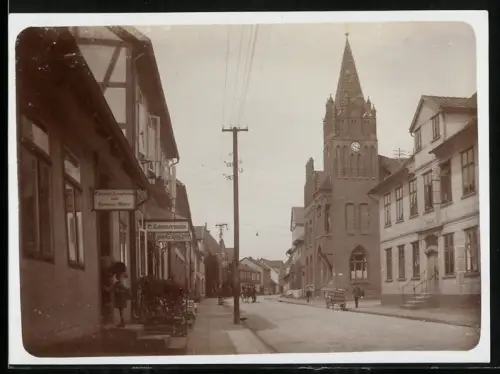 Fotografie unbekannter Fotograf, Ansicht Walsrode, Strassenpartie im Ort mit Geschäften
