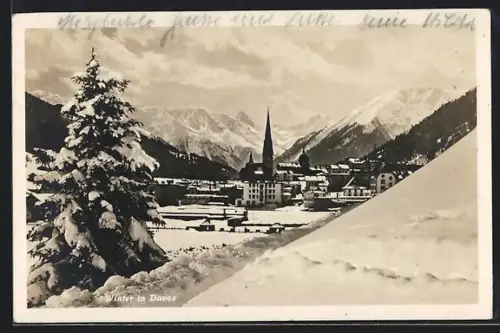 AK Davos, Teilansicht mit Kirche im Winter