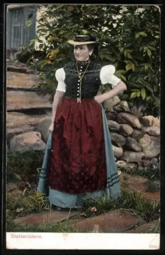 AK junge Bayerin in Tracht im Garten