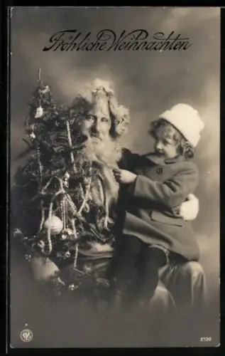 AK Weihnachtsmann mit einem Kind auf dem Schoss und einem geschmückten Weihnachtsbaum