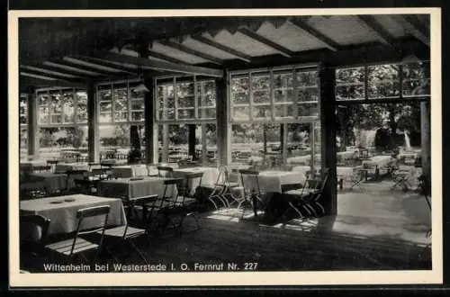 AK Wittenheim bei Westerstede I. O., Innenansicht eines Gartenlokals mit Terrasse und Sitzplätzen
