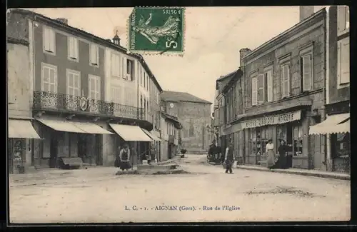 AK Aignan /Gers, Rue de l`Église avec boutiques et passants