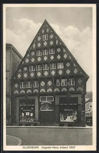 AK Oldenburg / O., Degode-Haus mit Strassenpartie