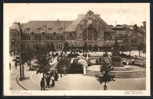 AK Aachen, Hauptbahnhof, Platz mit Brunnen und Denkmal