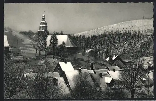 AK Wildemann /Harz, Winteransicht mit Kirche und verschneiten Häusern