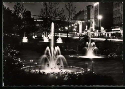 AK Köln am Rhein, Kaiser-Wilhelm-Ring mit Springbrunnen bei Nacht