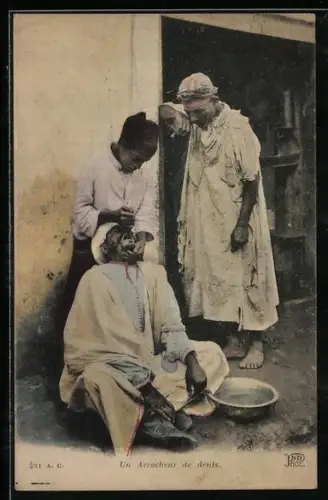AK Arabischer Zahnarzt zieht einen Zahn