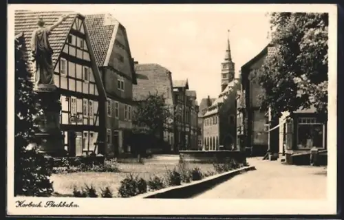 AK Korbach, Stechbahn, Fachwerkhäuser, Statue, Kirchturm