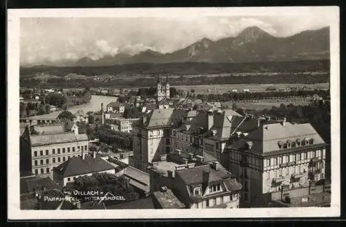 AK Villach, Blick über die Dächer zum Parkhotel und Mittagskogel