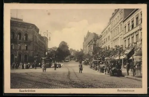 AK Saarbrücken, Reichsstrasse mit Strassenbahn