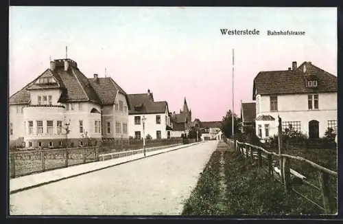 Goldfenster-AK Westerstede, Bahnhofstrasse mit leuchtenden Fenstern
