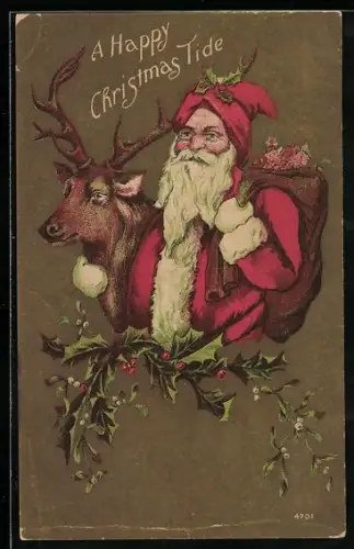 AK der Weihnachtsmann mit einem Rentier über Mistelzweigen