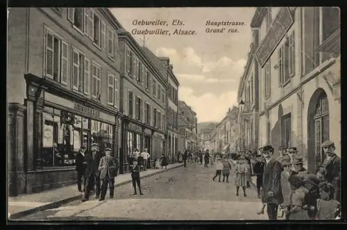 AK Guebwiller /Alsace, Hauptstrasse mit Geschäften