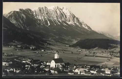 AK Gröbming, Dorf mit Kirche und dem Grimming