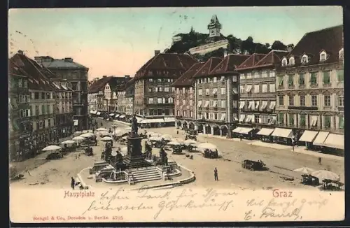 AK Graz, Hauptplatz mit Brunnen und Schlossberg mit Uhrturm