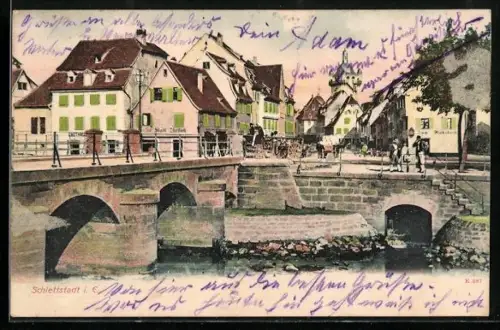 AK Schlettstadt i. E., Strassenpartie mit Brücke